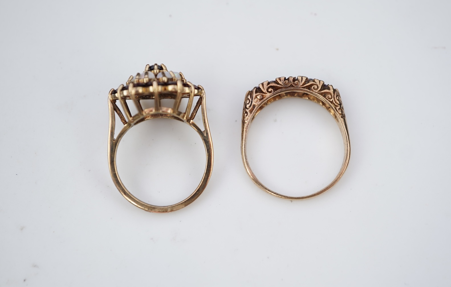 Two 19th century white metal mounted horn snuff mulls, one engraved 'John Calder', the other with inset tiger's eye quartz cabochon, both a.f., largest 83mm.